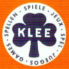 Kreis, darin  das Wort Spiele in 6 Sprachen, schwarzes dreiblättriges Kleeblatt, gerade, darin KLEE in weiß